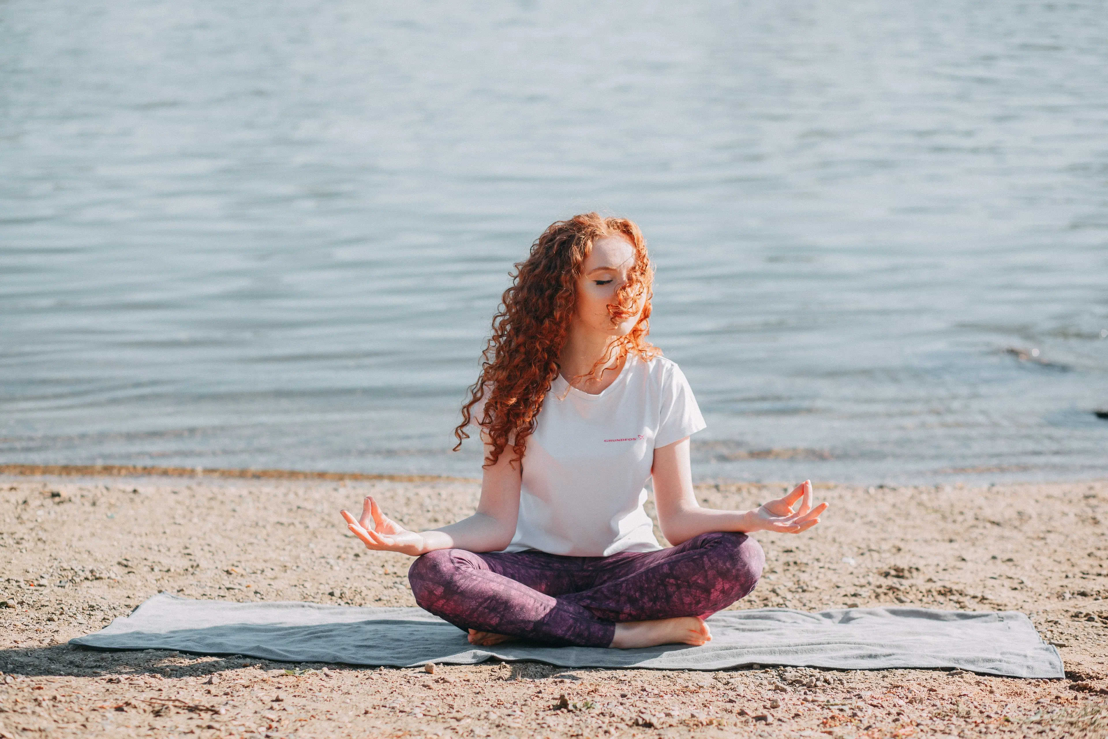 woman-doing-yoga-exercise-at-the-sea-shore-3759660.jpg
